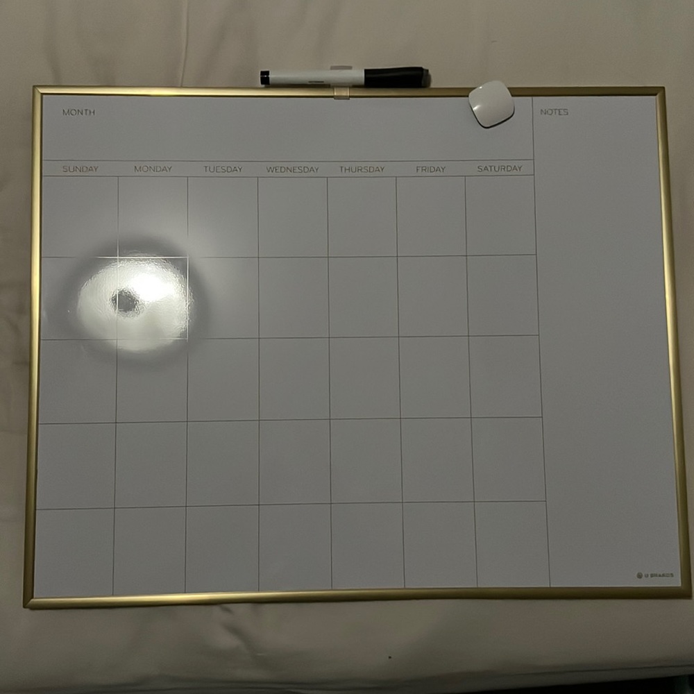 White board calendar from target. Colored gold and comes with marker and magnet